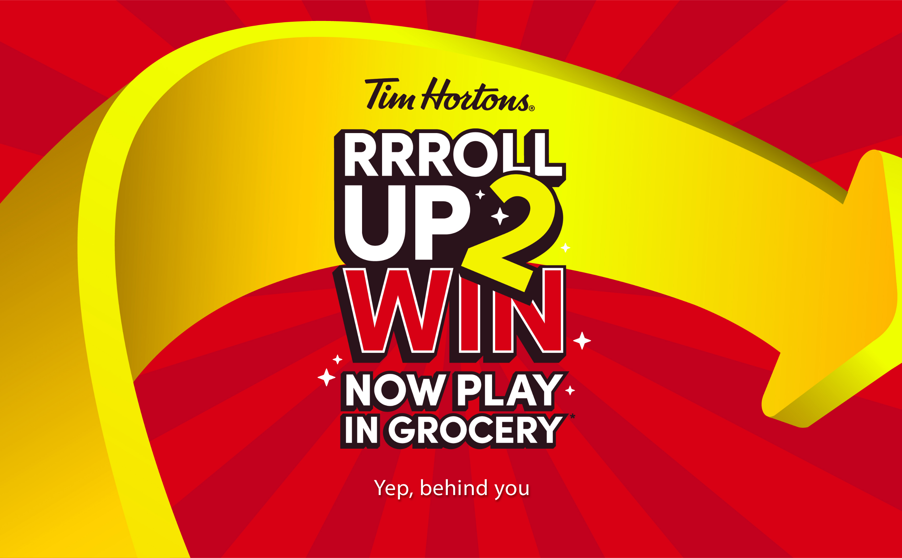 The image features a red and yellow promotional graphic for Tim Hortons' "Roll Up 2 Win" event with the text "Now Play in Grocery" and "Yep, behind you."