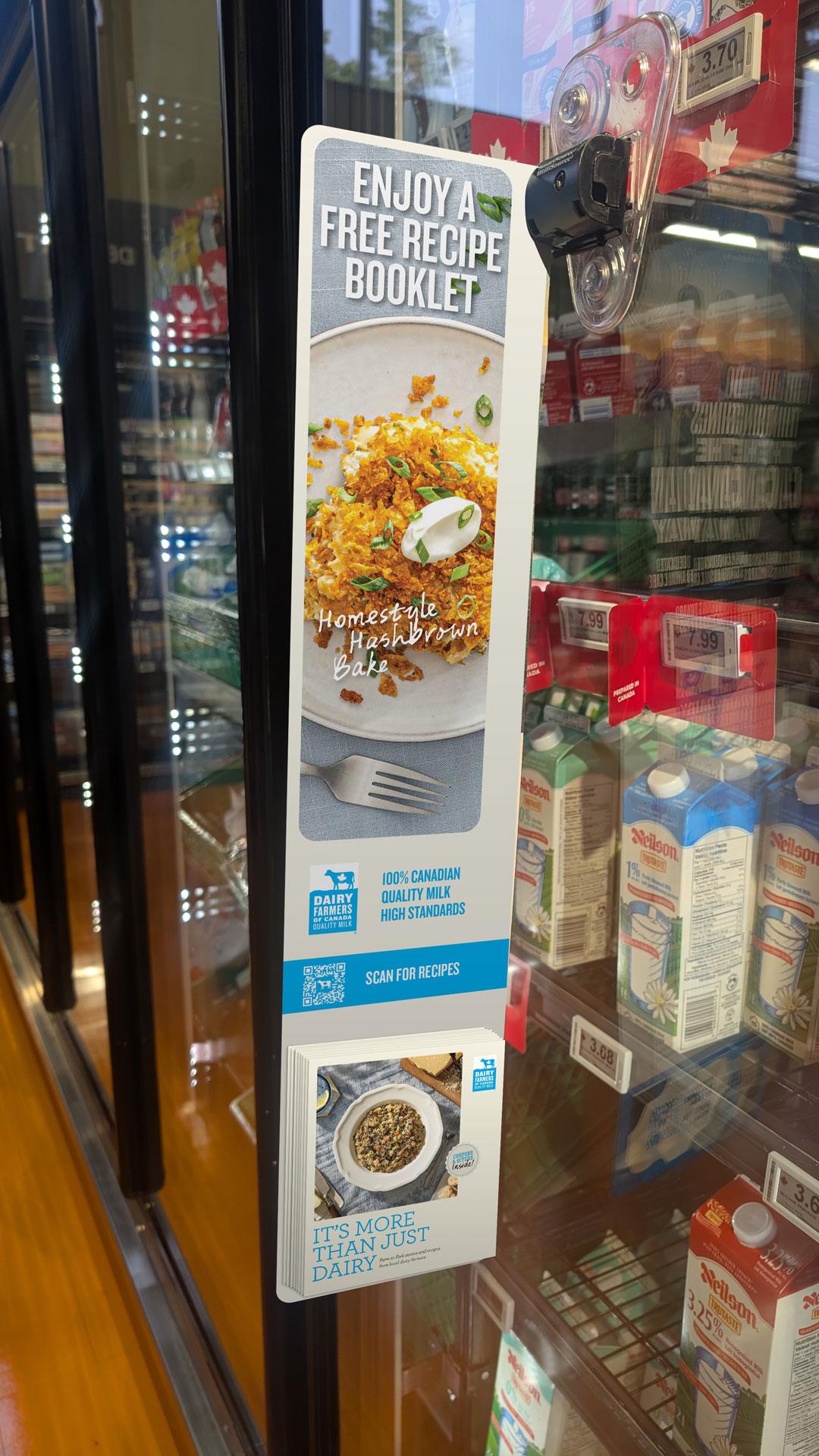 A dairy display in a store with a sign offering a free recipe booklet for a homestyle hashbrown bake.
