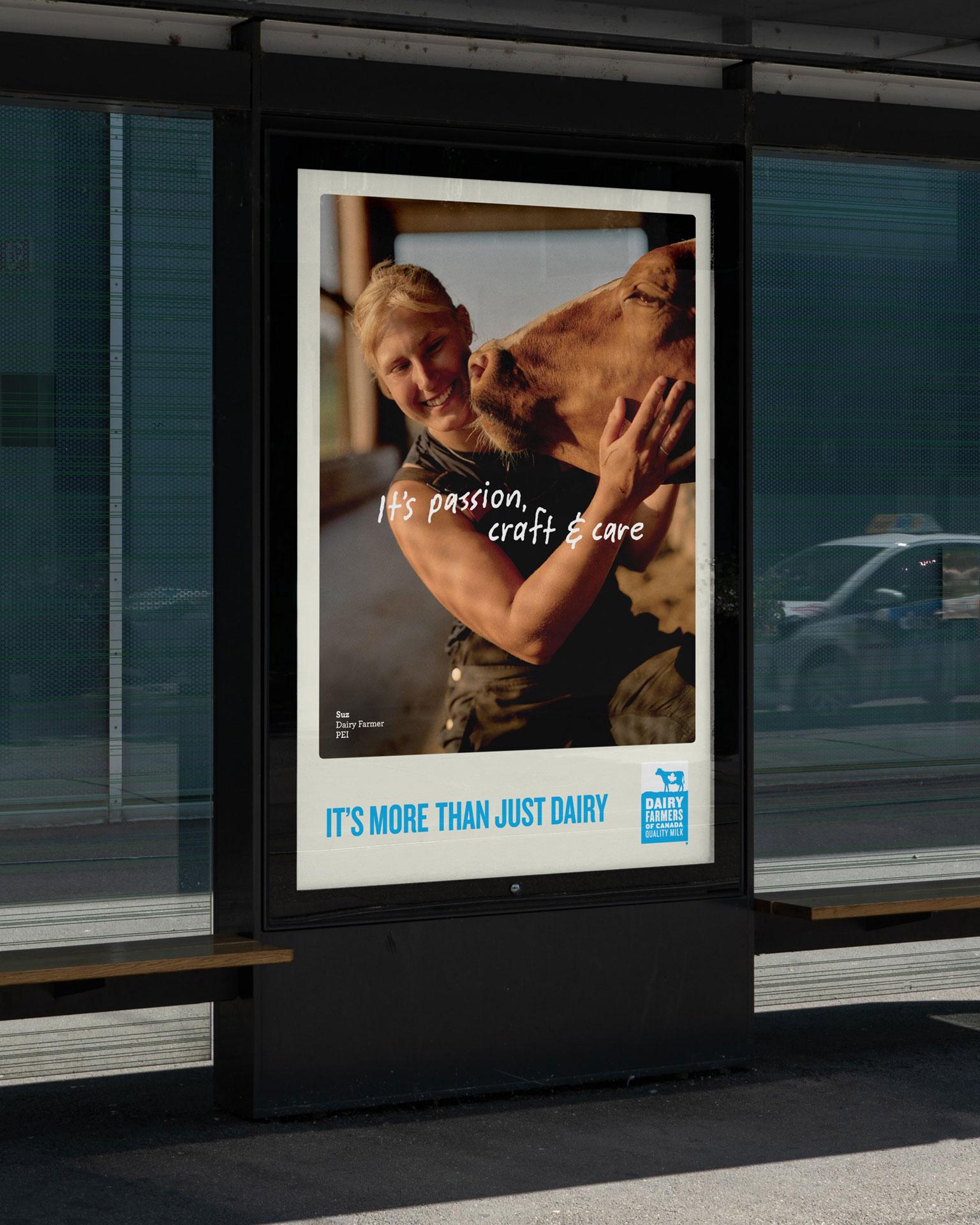 A smiling person embraces a cow in a poster at a bus stop, with text saying "It's passion, craft & care" and "It's more than just dairy."