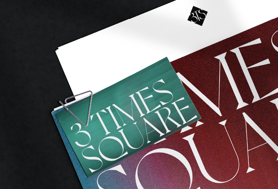 A stack of papers with "3 TIMES SQUARE" written in bold on one of them, clipped together.