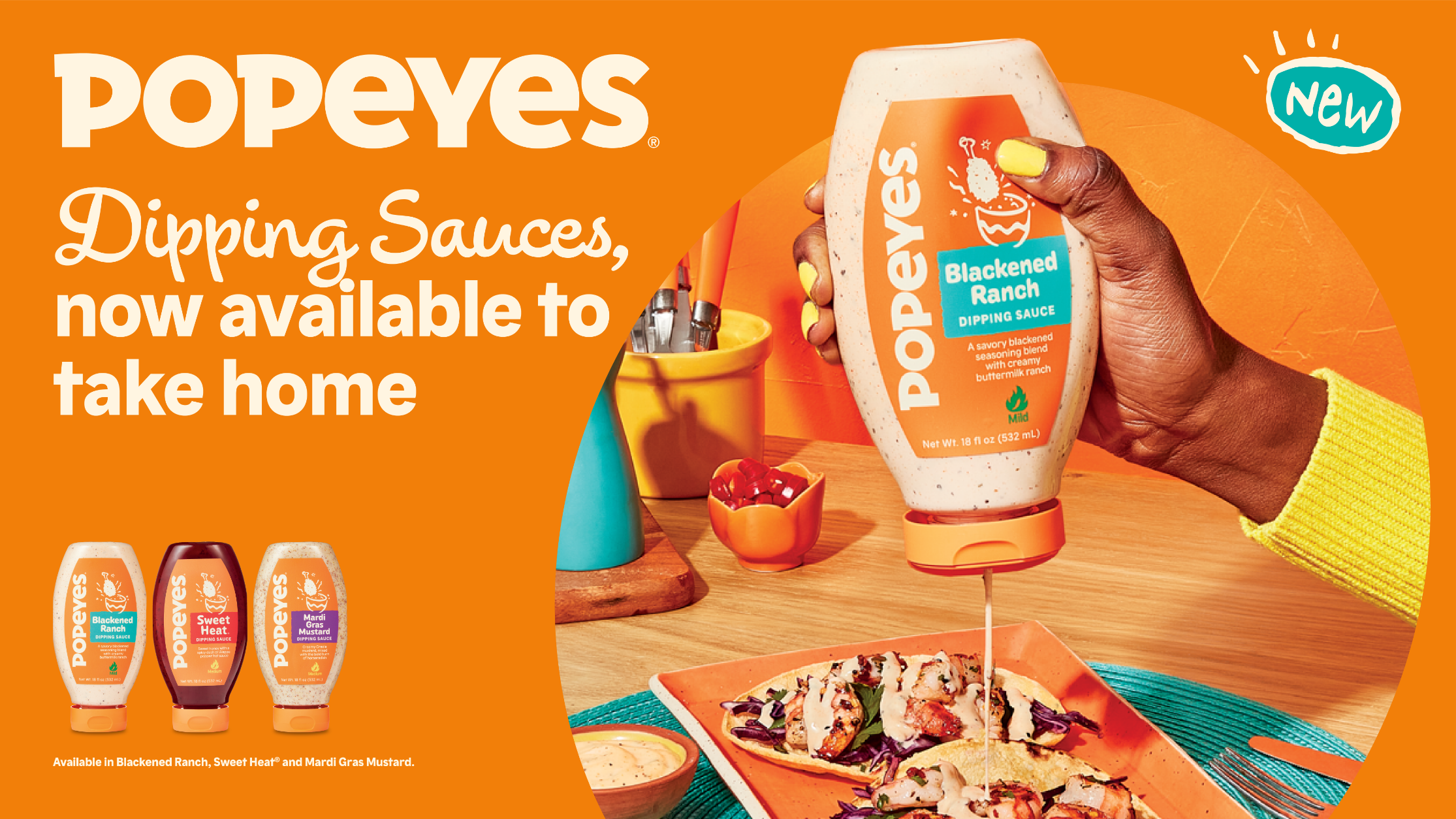 A hand holds a bottle of Popeyes Blackened Ranch dipping sauce above a plate of food, with text announcing the sauces are now available to take home.