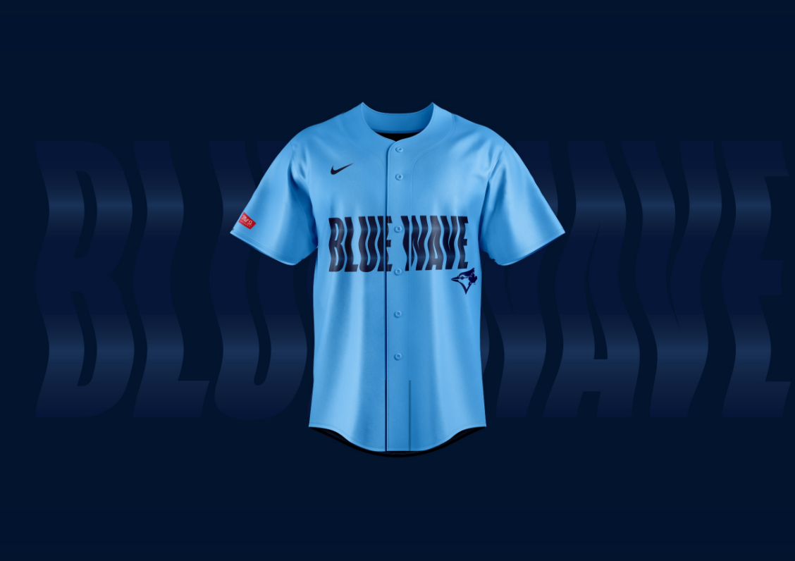 Un maillot de baseball bleu clair avec le texte « BLUE WAVE » et un petit logo sur la poitrine.