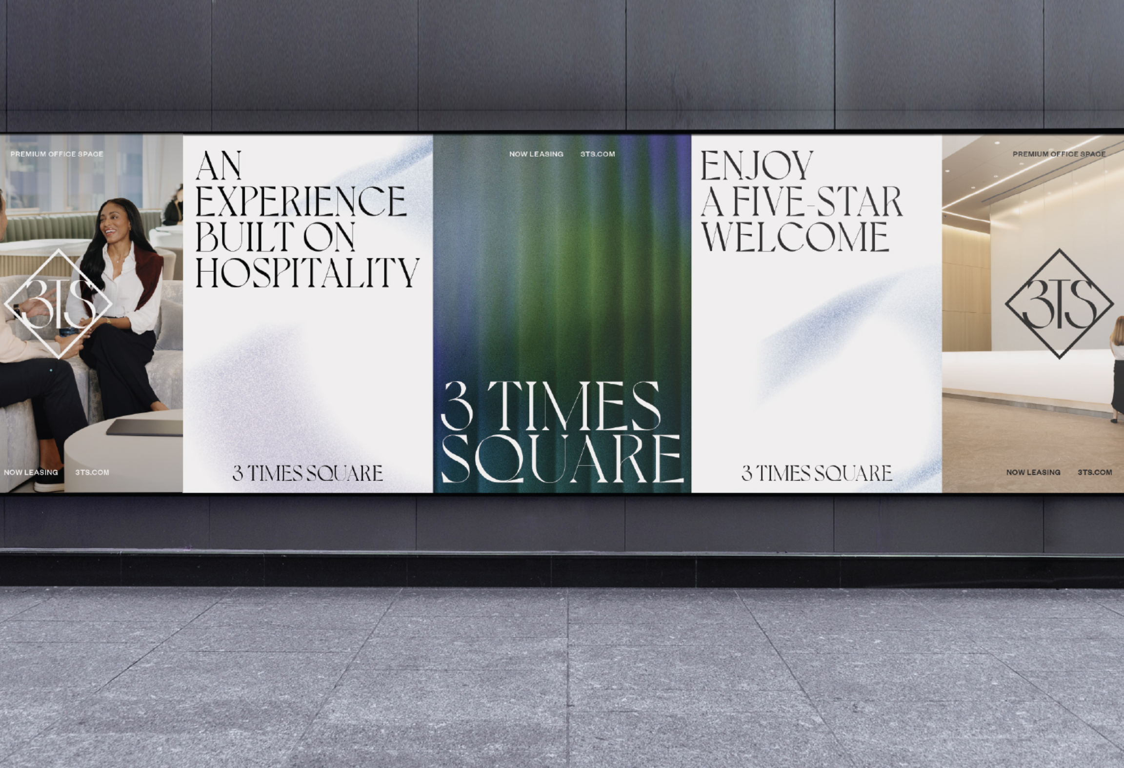 Digital display at 3 Times Square promoting premium office space with a hospitality theme.